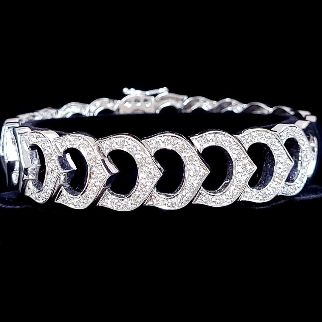 The supreme brilliance of 1.63ct natural diamonds, width 15mm, 46.42g, massive K18WG design bracelet [with identification report].