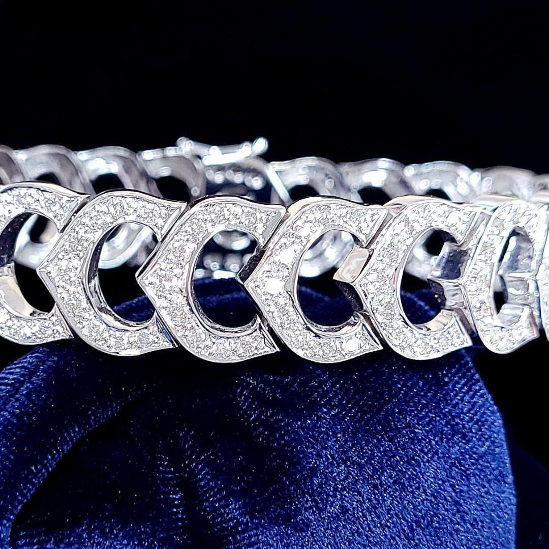 The supreme brilliance of 1.63ct natural diamonds, width 15mm, 46.42g, massive K18WG design bracelet [with identification report].