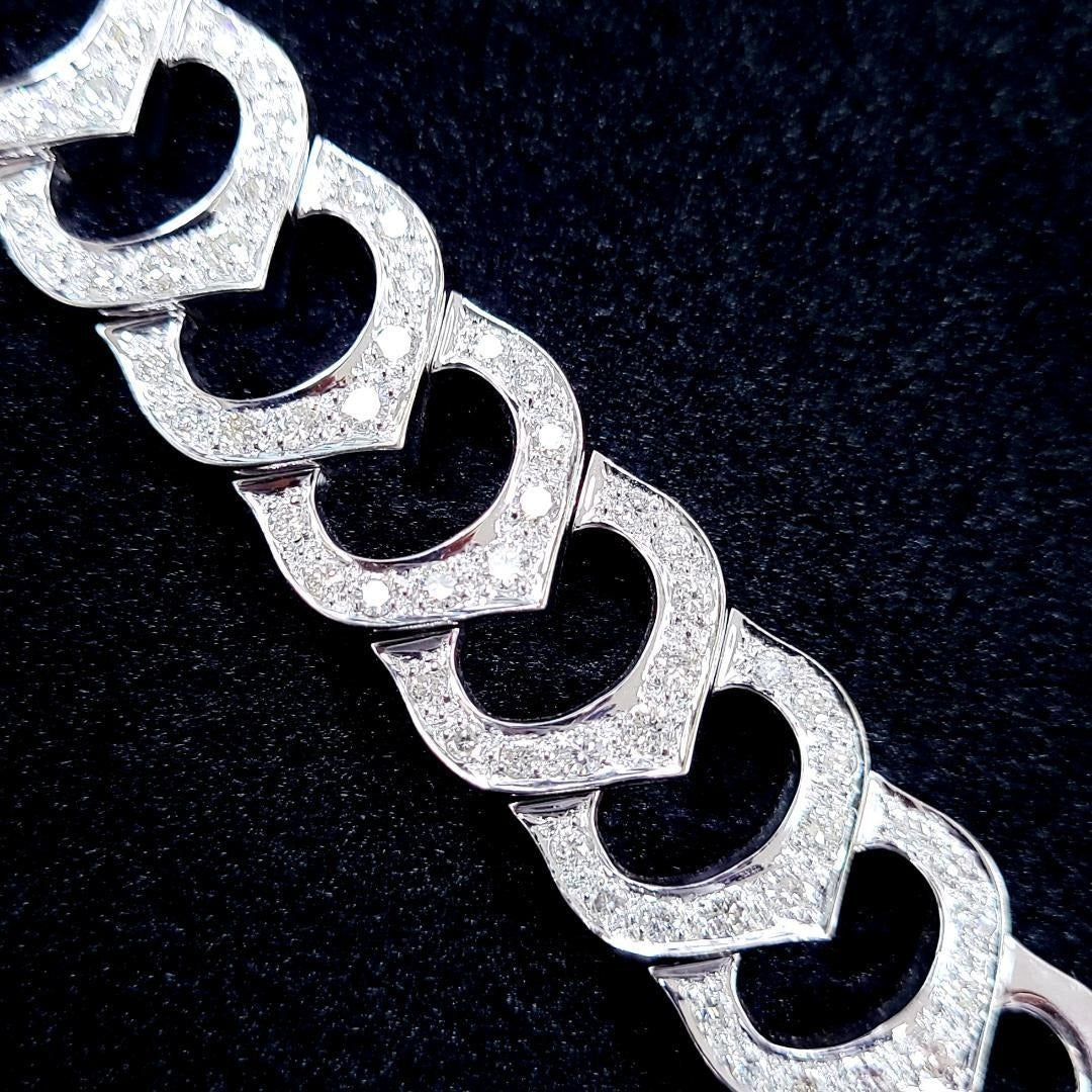 The supreme brilliance of 1.63ct natural diamonds, width 15mm, 46.42g, massive K18WG design bracelet [with identification report].