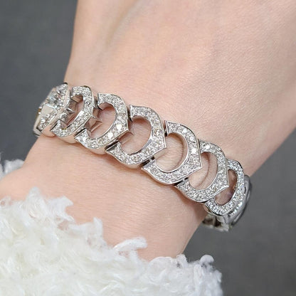 The supreme brilliance of 1.63ct natural diamonds, width 15mm, 46.42g, massive K18WG design bracelet [with identification report].