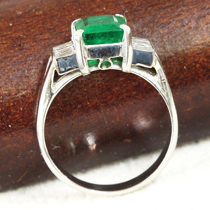 Dark green Colombian 1.18ct emerald diamond Pt900 platinum ring with certificate of authenticity.