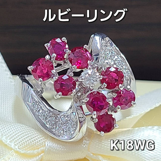 Beautifully crafted natural ruby and diamond K18 WG white gold 18k gold wave ring ring with July birthstone certificate.